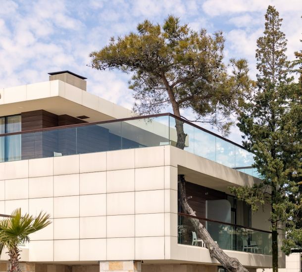 white concrete house at daytime close-up photography